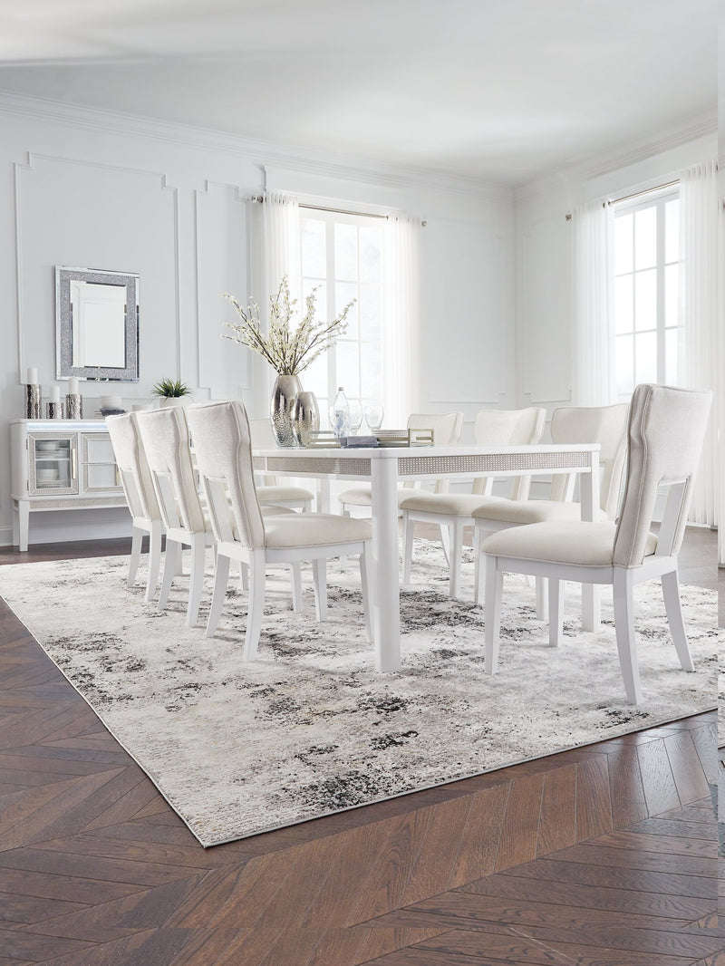 Ashley Furniture Chalanna dining room set with a table and matching chairs, featuring a modern design in a well-lit dining space.