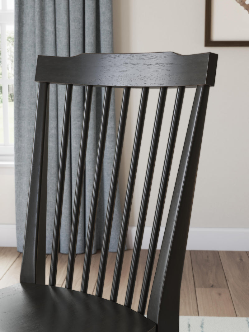 Ashley Furniture Greddinton dining room set with a wooden table and matching chairs, detailed view of the elegant dining furniture.