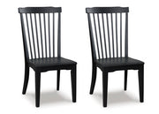 Ashley Furniture Greddinton Dining Room Set with a wooden table and matching chairs, shown from an angled view.