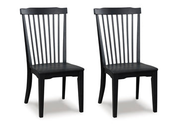 Ashley Furniture Greddinton Dining Room Set with a wooden table and matching chairs, shown from an angled view.
