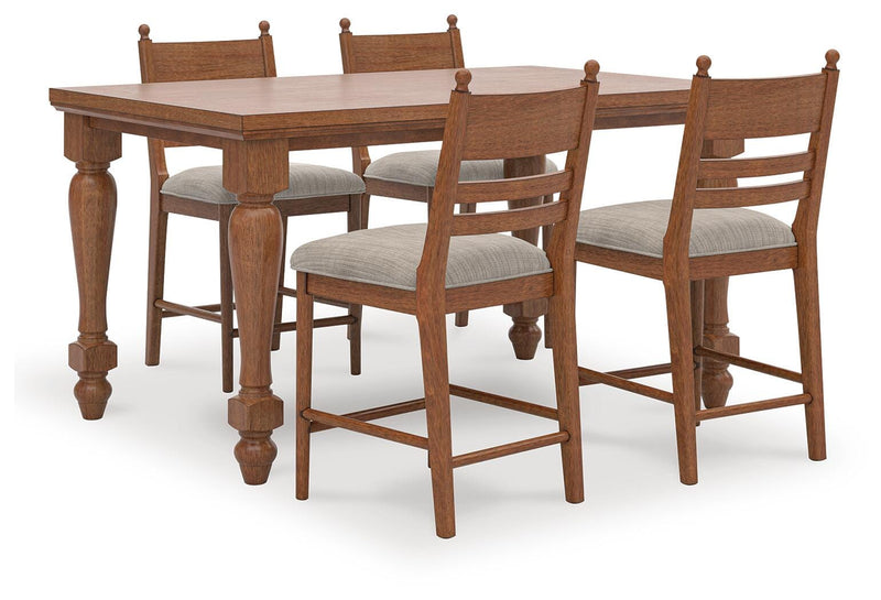Ashley Furniture Greddinton dining room set with a table and matching chairs, featuring a warm wood finish and classic design.