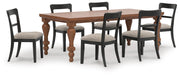 Ashley Furniture Greddinton dining room set with a wooden table and matching chairs, elegant design for a dining space.