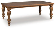 Ashley Furniture Greddinton dining room set featuring a rectangular table with six upholstered chairs, shown from an angled perspective.