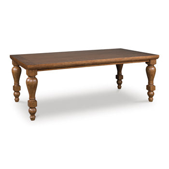 Ashley Furniture Greddinton dining room set with a large wooden table and upholstered chairs, shown from an angle.