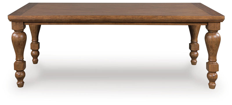 Ashley Furniture Greddinton dining room set with a wooden table and upholstered chairs, shown from a head-on angle.