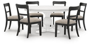 Ashley Furniture Greddinton dining room set with a wooden table and matching chairs in a modern home setting.