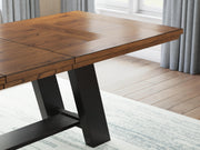 Ashley Furniture Greddinton dining room set with a polished wooden table and upholstered chairs, shown in a detailed close-up image