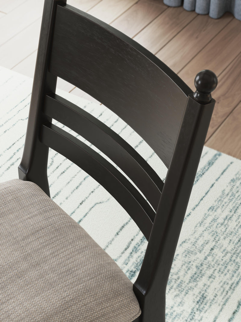 Ashley Furniture Greddinton dining room set with a table and matching chairs, showcasing a classic wooden design and elegant finish.