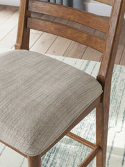 Ashley Furniture Greddinton dining room set with a wooden table and six upholstered chairs, detailed view of the elegant furniture.