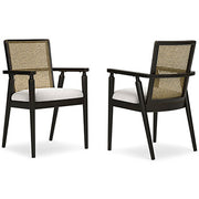 Ashley Furniture Galliden dining arm chair with wooden legs and upholstered seat, shown from an angled side view.