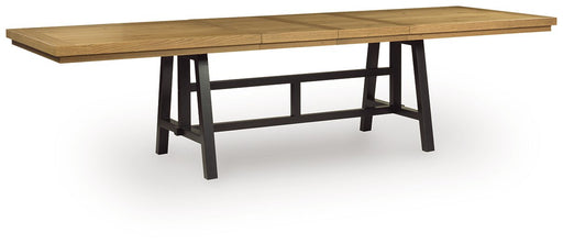Ashley Furniture Galliden dining extension table with a wood finish, shown from an angle with the extension leaf in place.
