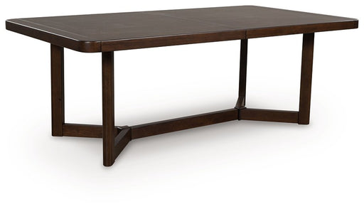 Ashley Furniture Dilenno dining extension table with a wooden finish, shown from an angled side view highlighting its extendable design.