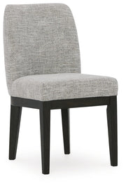 Ashley Furniture Burkhaus dining room set with a table and chairs, angled view showing wood finish and modern design.