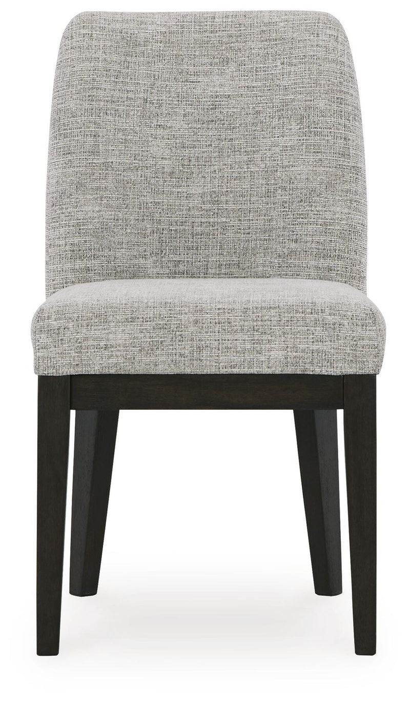 Ashley Furniture Burkhaus dining room set with a table and chairs, shown from a head-on angle in a modern dining space.
