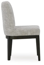 Ashley Furniture Burkhaus dining room set with a table and matching chairs, showcasing a modern wooden design.