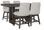 Ashley Furniture Burkhaus dining room set with a wooden table and matching chairs, modern design in a spacious dining area.