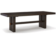 Ashley Furniture Burkhaus dining room set with a rectangular table and six upholstered chairs, shown from an angled side view.