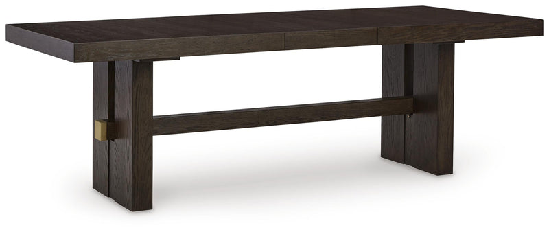 Ashley Furniture Burkhaus dining room set with a wooden table and upholstered chairs, shown from an angled side view.