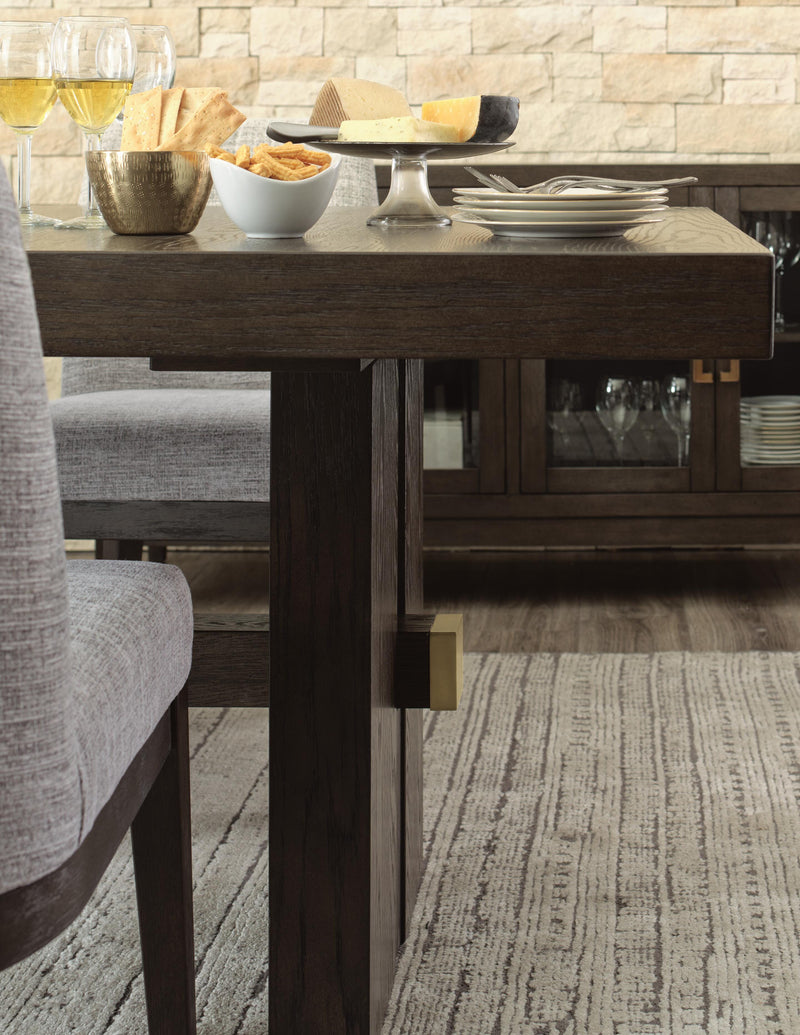 Ashley Furniture Burkhaus dining room set with a wooden table and matching chairs, detailed view of the table base.