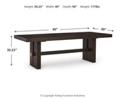 Ashley Furniture Burkhaus dining room set with a wooden table and matching chairs arranged in a modern dining space.