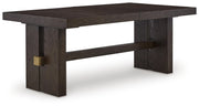 Ashley Furniture Burkhaus dining room set with a table and chairs, shown from an angled side view in a modern dining space.