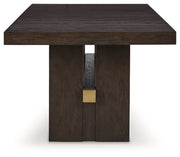 Ashley Furniture Burkhaus dining room set with a wooden table and six matching chairs, shown in a modern dining space.