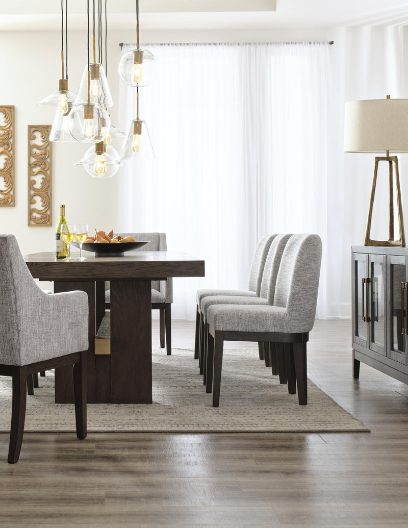 Ashley Furniture Burkhaus dining room set with a table and chairs, featuring a modern design in a cozy dining space.