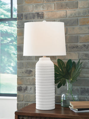 Pair of Vauville table lamps by Ashley Furniture, featuring classic design with fabric shades and wooden bases.