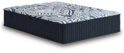 Ashley Furniture Firm Luxe 2.0 innerspring mattress shown from an angle, highlighting plush top and supportive structure.