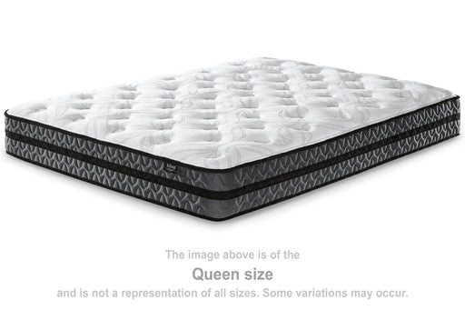 Ashley Furniture 10-inch pocketed hybrid king mattress with innerspring design, shown at an angle highlighting its plush surface.