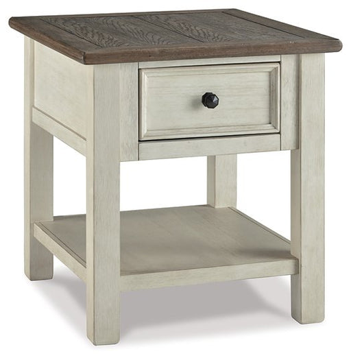 Ashley Furniture Bolanburg End Table featuring a modern design with a smooth wood finish and sturdy metal legs.