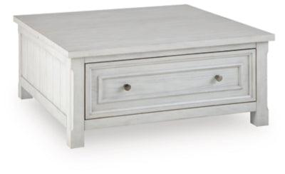 Ashley Furniture Robbinsdale lift-top coffee table with a sleek design, shown from an angled view with the top closed.