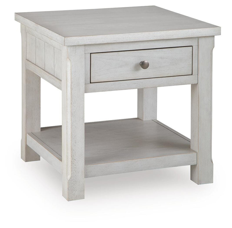Ashley Furniture Robbinsdale end table with a dark wood finish and a closed storage drawer, viewed from an angle.