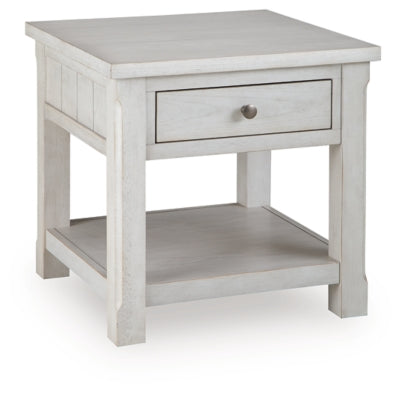 Ashley Furniture Robbinsdale end table with a dark wood finish and a closed storage drawer, viewed from an angle.