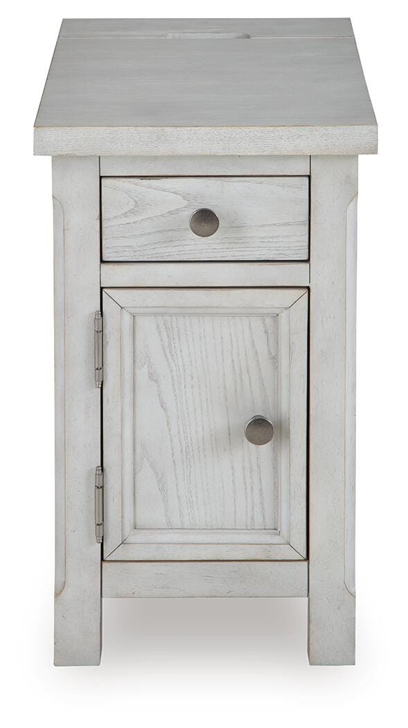 Ashley Furniture Robbinsdale chairside end table with a wood finish, featuring a compact design and a flat tabletop surface.