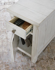 Ashley Furniture Robbinsdale chairside end table with open storage, featuring a sleek wooden surface and modern design.