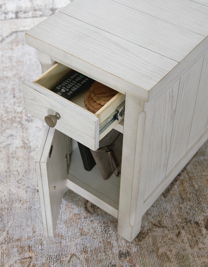 Ashley Furniture Robbinsdale chairside end table with open storage, featuring a sleek wooden surface and modern design.