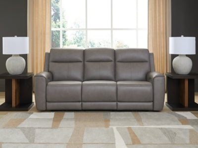 Ashley Furniture 5Z-Comfort power reclining sofa with plush cushions and modern design, shown in a cozy living room setting.