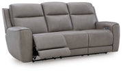 Ashley Furniture 5Z-Comfort Power Reclining Sofa shown from an angle with open reclining seats and plush cushions.