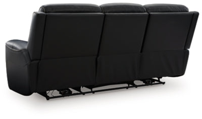 Ashley Furniture 5Z-Comfort power reclining sofa showing plush back cushions and reclining mechanism in a modern living room setting.