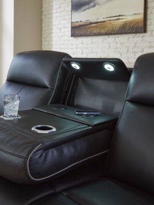 Ashley Furniture 5Z-Comfort Power Reclining Sofa showcasing plush cushions, reclining mechanism, and sleek fabric upholstery.