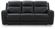 Ashley Furniture 5Z-Comfort Power Reclining Sofa with plush cushions and reclining features, shown from a front head-on view.