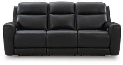 Ashley Furniture 5Z-Comfort Power Reclining Sofa with plush cushions and reclining features, shown from a front head-on view.