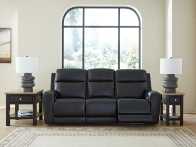Ashley Furniture 5Z-Comfort Power Reclining Sofa shown open with plush cushions and reclining mechanism in a modern living room setting.