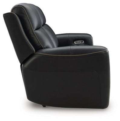 Ashley Furniture 5Z-Comfort Power Reclining Sofa with plush upholstery and built-in recline mechanism, shown from the side.
