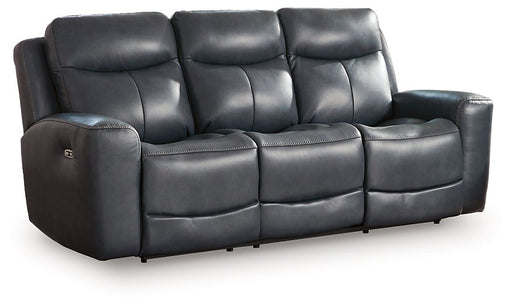 Ashley Furniture Next Move power reclining sofa shown from an angled view, featuring plush cushions and a dark upholstery.