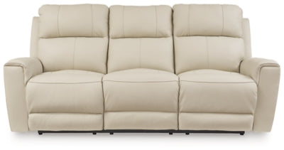 Ashley Furniture Dahlmoore power reclining sofa with plush cushions and dark upholstery, shown from a head-on angle.