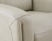 Ashley Furniture Pincara Power AutoGlide Recliner with jumbo stitch detailing, featuring plush upholstery and smooth reclining mechanism.
