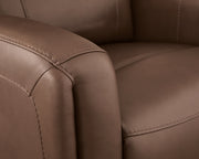 Ashley Furniture Pincara Power AutoGlide recliner with jumbo stitch detailing, featuring plush upholstery and a comfortable reclining design.
