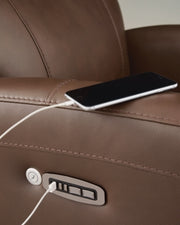 Ashley Furniture Pincara Power AutoGlide Recliner with heating and massage features, USB port, in a comfortable recliner design.
